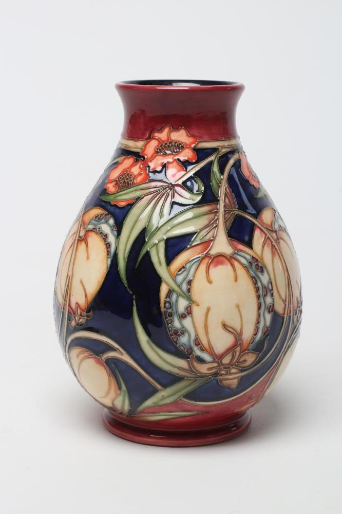 A MOORCROFT POTTERY VASE, post 2003, of squat baluster form, tubelined and painted by Alison Edwards