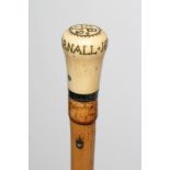 A GENTLEMAN'S CANE, late 17th century/early 18th century, the polished ivory pommel with pique