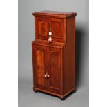 A VICTORIAN WALNUT PIER CABINET, the moulded cornice over two fielded panel doors, cushion moulded