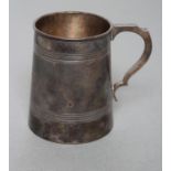 A MUG, maker Harrod's Stores Ltd., Sheffield 1916, of tapering cylindrical form engraved "JVC"