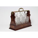 A LATE VICTORIAN ROSEWOOD AND FOLIATE MARQUETRY TANTALUS, "The Cabinet", maker Mappin & Webb, of