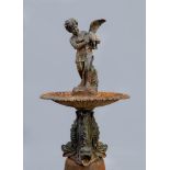 A CAST IRON FOUNTAIN, 20th century, the shallow fluted bowl with moulded rim on baluster stem with