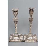 A PAIR OF LATE VICTORIAN NEO CLASSICAL STYLE CANDLESTICKS, maker Martin, Hall & Co., London 1893,