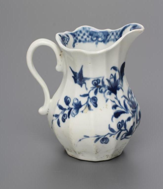 A FIRST PERIOD WORCESTER PORCELAIN MILK JUG, c.1760, of faceted baluster form painted in - Image 2 of 3