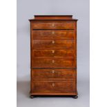 A BIEDERMEIER STYLE SEMAINIER MAHOGANY TALL CHEST, 19th century, of canted oblong form with kingwood