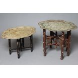 A BENARES FOLDING TABLE, 19th century, the pierced repousse brass lobed oval tray on turned