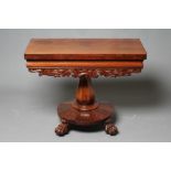 A VICTORIAN SCOTTISH MAHOGANY FOLDING TEA TABLE, of rounded oblong form with swivel top, cushion
