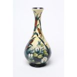 A MOORCROFT POTTERY BOTTLE VASE, 1996, by Hayley Grocott-Smith, tubelined and painted by Amanda