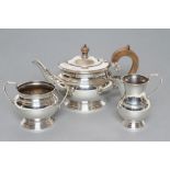 A THREE PIECE TEA SERVICE, maker Garrard & Co. Ltd., Sheffield 1979, of baluster form, comprising