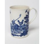 A FIRST PERIOD WORCESTER PORCELAIN MUG, c.1775, of cylindrical form printed in underglaze blue