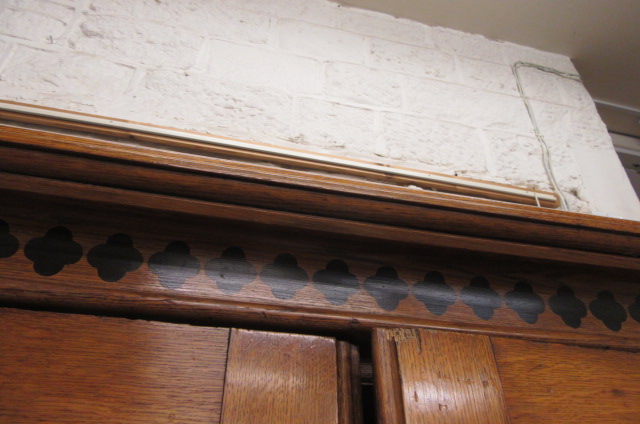 A GOTHIC REVIVAL LIGHT OAK AND BLACK STENCILLED WARDROBE, in the manner of Marsh, Jones & Cribb, the - Image 7 of 13