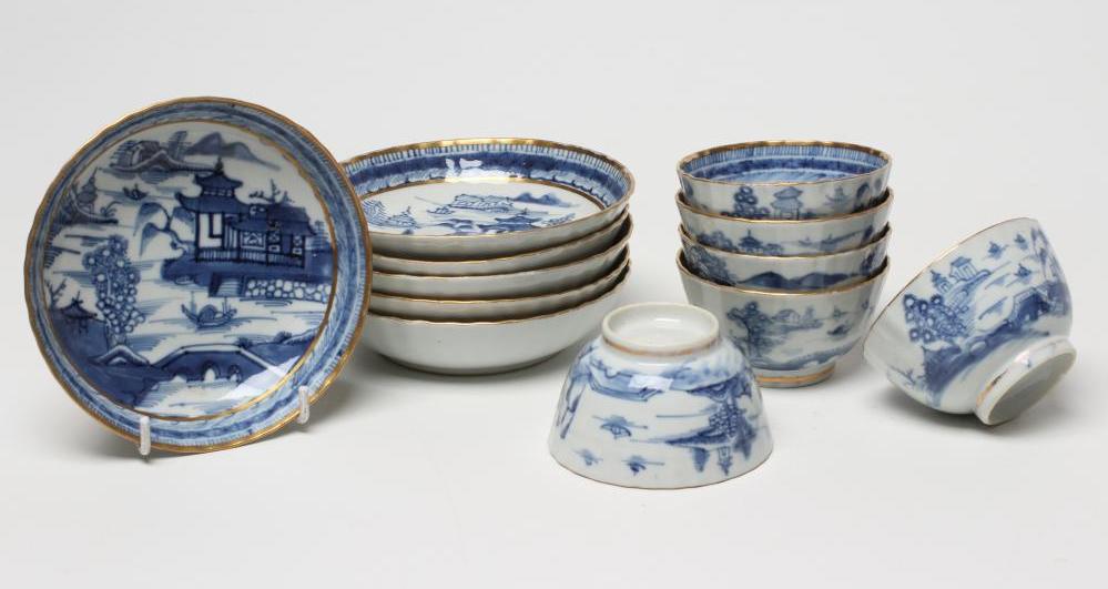 A SET OF SIX CHINESE PORCELAIN RIBBED TEABOWLS AND SAUCERS painted in underglaze blue with a