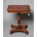 A GONCALO ALVES(?) OCCASIONAL TABLE, early/mid 19th century, the rounded oblong top and plain frieze