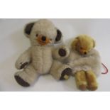 A Merrythought cream "Cheeky" teddy, with rotating joints, internal bell, and label to foot, 15",