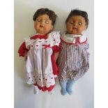 Two Schutz celluloid socket head dolls, with sleeping eyes (one brown one blue), open mouths, two