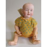 A Kley & Hahn bisque socket head baby doll with painted eyes, moulded and painted hair, bent limb