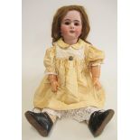 A Depose bisque socket head doll with brown glass sleeping eyes, open mouth with four moulded top