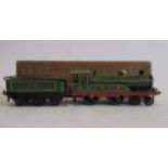 Hornby Clockwork No2 locomotive and tender finished in L.N.E.R. green, 2711 to tender, boxed, F (