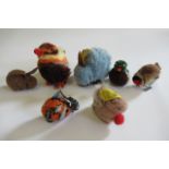 Seven Steiff pom poms, comprising a rooster, squirrel and blue rabbit with Steiff tags, and a