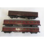 Exley K5 L.M.S. Suburban 3rd, much overpainted, P, and two Lima L.M.S. passenger coaches (Est.