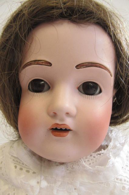 A Kestner bisque shoulder head doll with brown glass sleeping eyes, open mouth with four top - Image 2 of 3