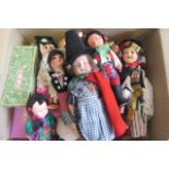 A collection of twelve small dolls including a Herman Steiner bisque socket head doll, with blue