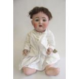 A Catterfelder Puppenfabrik bisque socket head doll, with Kestner mark, blue glass sleeping eyes,