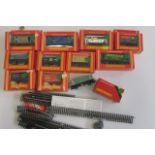 Eleven Hornby Goods Trucks including Brake Van, Rail Stores Van, Lion Works Wagon, Tarmac Hopper and