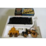 A Hornby 3 1/2" gauge Stephenson's Rocket locomotive, boxed, with track, and a Rocket coach "