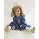 A Simon & Halbig bisque socket head doll with blue glass sleeping eyes, open mouth with four moulded