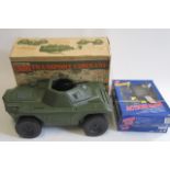 An Action Man Armoured Car, boxed F, and two Action Man electronic figures, boxed (Est. plus 21%