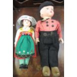 A walking Dutch boy doll with painted composition head and arms, cotton and felt outfit, hat and