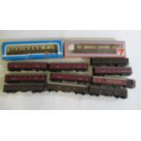 Passenger service coaches and siphon wagons by Hornby and others and two Express Parcels rail
