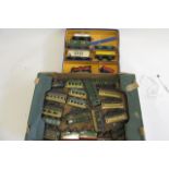 Playworn tinplate rolling stock by various makers including goods truck, passenger coaches and