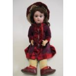 A Tete Jumeau size 12 bisque socket head doll, with blue paperweight glass eyes, open mouth with six