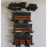 Bing electric 0-4-0 locomotive and tender finished in black, lined in red, 0-35 to cab, some paint