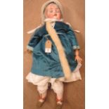 A German bisque socket head doll with blue glass sleeping eyes, open mouth with four moulded upper