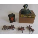 Astra Model searchlight in gas mask, box G, and a Britains horsedrawn gun carriage, parts missing,