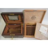 A box of 12 Upmann Sir Winston cigars, together with a humidor of 8 Trinidad cigars (2) (Est. plus
