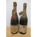 1 bottle 1943 Moet & Chandon Dry Imperial Champagne, and 1 bottle 1941 George Goulet champagne,