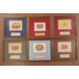 A collection of 6 professionally framed cigar labels, including Upmann, Romeo y. Julieta, Bolivar,
