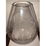 A mid century clear glass vase. 26cms h.