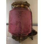 Brass and pink glass hanging ceiling light, shade with acid etched decoration, woodland scene with