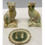 A rare pair of Wheildon pottery cats, 10cms h on cushions and a child's dish of peas, both with tiny