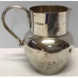 Hallmarked silver jug, 11cms tall, London 1918/19 approx 242gms.