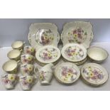 Tuscan china part tea set, floral pattern with gilt rims. 34 pieces.