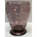 A 1970's purple glass vase with ribbed sides. 20cms h.