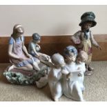Two Lladro figures, three angels singing, girl and boy with ducks and another.