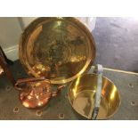 A 19th century copper kettle, brass jam pan and brass tray. 59cms d.