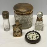 Two hallmarked silver topped scent bottles, silver topped glass jar and a sterling silver pocket